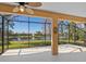 Outdoor living space with lake view at 1888 Batello Dr, Venice, FL 34292