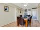 Comfortable dining room with classic table, stylish chairs, and decorative accents at 200 Park N Blvd # 108, Venice, FL 34285