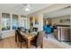 Cozy dining area featuring a beautiful table setting and natural light, ideal for gatherings at 200 Park N Blvd # 108, Venice, FL 34285