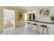 Kitchen bar with additional seating space provides a casual dining option and open floor plan at 200 Park N Blvd # 108, Venice, FL 34285