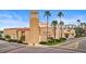 Venice Theatre building with a tower, surrounded by palm trees and landscaping at 200 Park N Blvd # 108, Venice, FL 34285