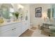 Bright bathroom featuring dual sinks, a makeup vanity, and modern fixtures at 20176 Tesoro Dr, Venice, FL 34293