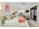Cozy bedroom featuring a desk, patio access, and a serene atmosphere at 20176 Tesoro Dr, Venice, FL 34293