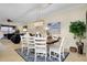 The open-concept dining area flows into the living room, great for entertaining at 20176 Tesoro Dr, Venice, FL 34293