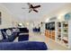 Open-concept living room connecting to the kitchen and dining area at 20176 Tesoro Dr, Venice, FL 34293