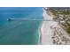 Beautiful aerial view of the pier and beach, highlighting the waterfront lifestyle and recreational opportunities at 206 Silver Lake Dr # 105, Venice, FL 34292