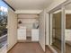 Lanai features a convenient laundry area with washer and dryer hookups for added functionality at 206 Silver Lake Dr # 105, Venice, FL 34292