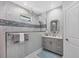 Luxurious bathroom with double vanity, stylish mirror, and spacious glass-enclosed shower at 226 W Pine Valley Ln, Rotonda West, FL 33947