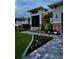 Beautiful home exterior with landscaped front yard and paver walkway at dusk at 226 W Pine Valley Ln, Rotonda West, FL 33947