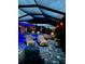 Beautiful covered pool with ample seating and relaxing atmosphere at 226 W Pine Valley Ln, Rotonda West, FL 33947