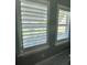 Interior shutters provide privacy and enhance the aesthetic appeal of the room at 226 W Pine Valley Ln, Rotonda West, FL 33947