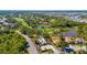 Aerial view of a golf course community, featuring lush greenery, ponds, and landscaped homes at 2292 Harrier Way, Nokomis, FL 34275