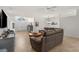 Spacious living room featuring tile flooring, ample natural light, and stylish contemporary decor at 2292 Harrier Way, Nokomis, FL 34275