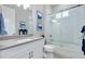 Bathroom features a shower-over-tub combination with white subway tiles and glass doors at 265 Bocelli Dr, Nokomis, FL 34275
