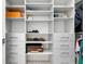 Well-organized walk-in closet with custom shelving and drawers for ample storage at 265 Bocelli Dr, Nokomis, FL 34275