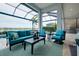 The outdoor living space features comfortable seating, views of the pool, and a tranquil setting for relaxing and entertaining at 265 Bocelli Dr, Nokomis, FL 34275