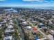 Aerial view of the property showcasing its location in a waterfront community with easy access to waterways and the ocean at 328 Channel Ln, Nokomis, FL 34275