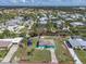 Aerial view of the property showing the waterfront location and neighborhood at 328 Channel Ln, Nokomis, FL 34275