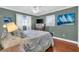 Serene bedroom features a ceiling fan and plenty of natural light at 328 Channel Ln, Nokomis, FL 34275