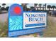 Nokomis Beach sign with restroom info. A popular destination with recreation at 328 Channel Ln, Nokomis, FL 34275
