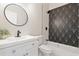Bathroom with vanity, patterned tiles, and modern fixtures at 3470 Elias Cir, North Port, FL 34288