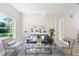 Cozy living room with ample natural light, modern furniture and neutral tones at 3470 Elias Cir, North Port, FL 34288