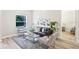 Bright living room featuring modern furniture and neutral tones at 3470 Elias Cir, North Port, FL 34288