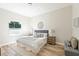 Inviting main bedroom with neutral decor, stylish furniture and lots of natural light at 3470 Elias Cir, North Port, FL 34288