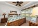 Bedroom featuring a ceiling fan and decorative wicker furniture including bed and dressers at 371 Capulet Dr, Venice, FL 34292