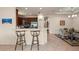 Spacious kitchen with breakfast bar and open view to the dining area at 371 Capulet Dr, Venice, FL 34292