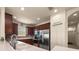 Well-equipped kitchen with stainless steel appliances and sleek cabinets at 371 Capulet Dr, Venice, FL 34292