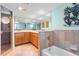 This bathroom has granite countertops, tile floors, and a bathtub at 3819 Aves Island Ct, Punta Gorda, FL 33950