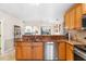 Well-equipped kitchen featuring granite countertops, stainless steel appliances, and ample cabinet space at 3819 Aves Island Ct, Punta Gorda, FL 33950
