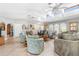 Spacious living area features tile flooring, vaulted ceilings, and an abundance of natural light at 3819 Aves Island Ct, Punta Gorda, FL 33950