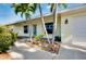 Charming home exterior with well-maintained landscaping and curb appeal at 420 Zephyr Rd, Venice, FL 34293