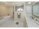 Beautiful bathroom features tub, shower, and a vanity with double sinks at 4358 Via Del Villetti Dr, Venice, FL 34293