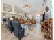Bright living space featuring a kitchen bar, comfortable seating, and elegant decor at 4358 Via Del Villetti Dr, Venice, FL 34293