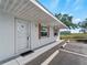 Exterior of a condo featuring well-maintained exteriors and parking spaces at 510 Airport E Ave # 2D, Venice, FL 34285