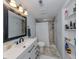 Bathroom featuring a vanity, shower, and tiled floors at 514 Pameto Rd, Nokomis, FL 34275