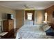 Bedroom with wood accents, a dresser, and dual closets at 530 Via Veneto, Venice, FL 34285