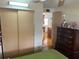 Bedroom view showcasing the closet and dresser at 530 Via Veneto, Venice, FL 34285