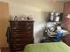 Comfortable bedroom with dresser and desk setup at 530 Via Veneto, Venice, FL 34285
