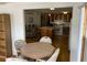 Spacious living area connecting the dining room, living room, and kitchen to offer a social setting at 530 Via Veneto, Venice, FL 34285