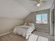 Cozy bedroom with natural light, neutral tones, and comfortable carpeting at 589 Rose Apple Circle, Port Charlotte, FL 33954