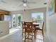 Inviting dining area with a wood table and abundant natural light at 589 Rose Apple Circle, Port Charlotte, FL 33954