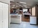 Spacious event space with hardwood floors, tables, and chairs, perfect for social gatherings at 589 Rose Apple Circle, Port Charlotte, FL 33954