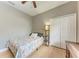 Cozy bedroom with a ceiling fan and closet at 740 Tanager Rd, Venice, FL 34293