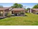 Cozy home with a well-maintained backyard lawn, perfect for outdoor relaxation and activities at 7515 Greystone Dr, Hudson, FL 34667