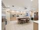 Spacious eat-in kitchen with stainless steel appliances and ample counter space, perfect for cooking and entertaining guests at 7515 Greystone Dr, Hudson, FL 34667