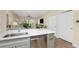Bright kitchen featuring stainless steel appliances and a modern countertop at 8403 Placida Rd # 205, Placida, FL 33946